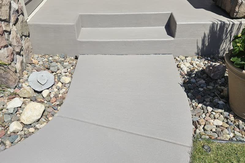 Outdoor concrete patio with even restored color after Clear View install