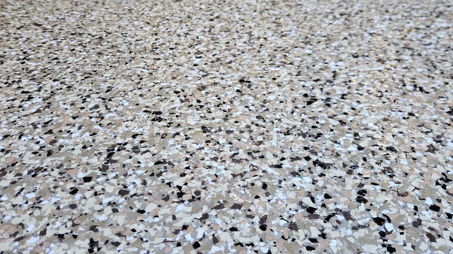 Polyurea garage floor coating with decorative flake installed by Clear View Surface Solutions in Chaska, MN